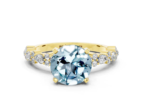 Yellow gold Round Cut Aquamarine Side Stone Solitaire Ring with Round  and Four-Prong Setting