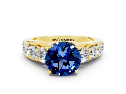 Yellow gold Round Cut Blue Sapphire Engagement Ring with Pavé Band and Four-Prong Setting
