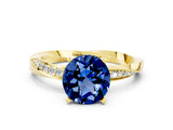 Yellow gold Round Cut Blue Sapphire Engagement Ring with Side Stone Accents and Four-Prong Setting_60