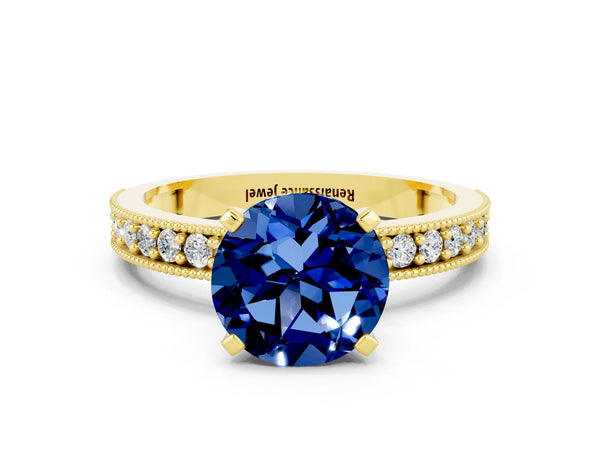 Yellow gold Round Cut Blue Sapphire Milgrain Pavé Engagement Ring with Four-Prong Setting