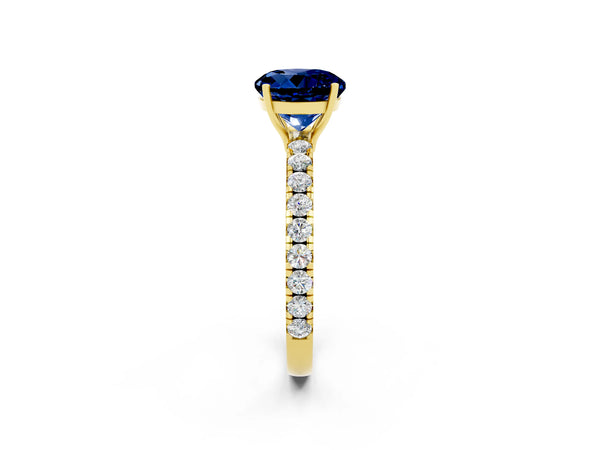 Yellow gold Round Cut Blue Sapphire Pavé Solitaire Engagement Ring with Four-Prong Setting