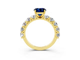 Yellow gold Round Cut Blue Sapphire Prong Setting with Side Stones on a Pave Band_3