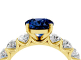 Yellow gold Round Cut Blue Sapphire Prong Setting with Side Stones on a Pave Band_4