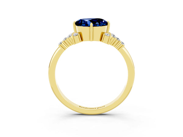 Yellow gold Round Cut Blue Sapphire Ring with Side Stones and Four-Prong Setting