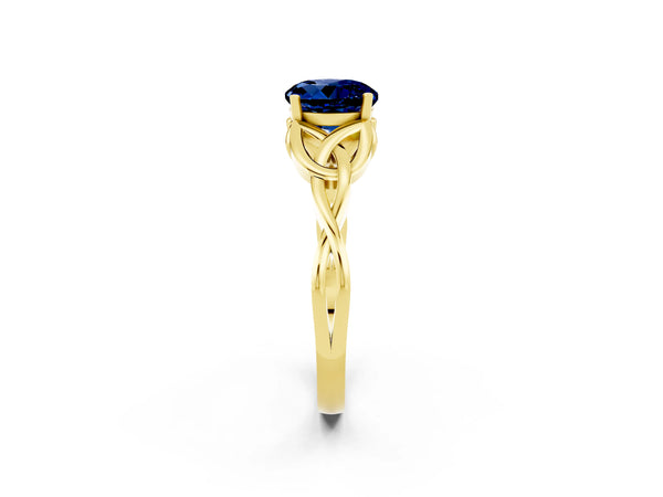 Yellow gold Round Cut Blue Sapphire Solitaire Celtic Knot Ring with Four-Prong Setting
