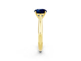 Yellow gold Round Cut Blue Sapphire Solitaire Engagement Ring with Cathedral Setting and Four-Prong Mount_32