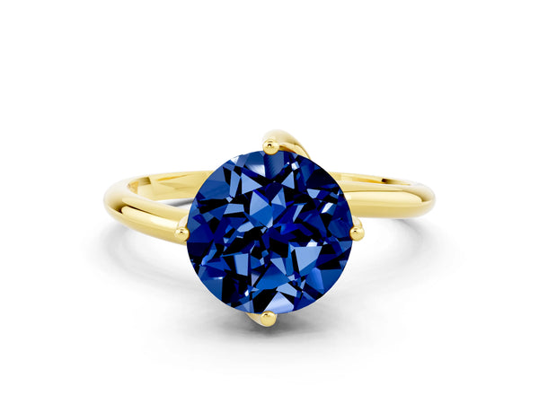 Yellow gold Round Cut Blue Sapphire Solitaire Engagement Ring with Four-Prong Setting and Classic Band