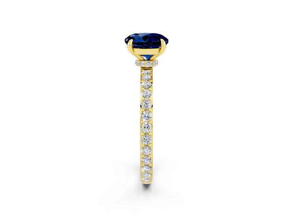 Yellow gold Round Cut Blue Sapphire Solitaire Engagement Ring with Pavé Band and Four-Prong Setting