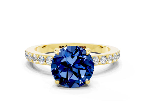 Yellow gold Round Cut Blue Sapphire Solitaire Engagement Ring with Pavé Band and Four-Prong Setting