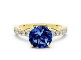 Yellow gold Round Cut Blue Sapphire Solitaire Pavé Band with Four-Prong Setting