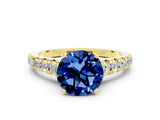 Yellow gold Round Cut Blue Sapphire Solitaire Ring with Cathedral Setting and Pavé Band