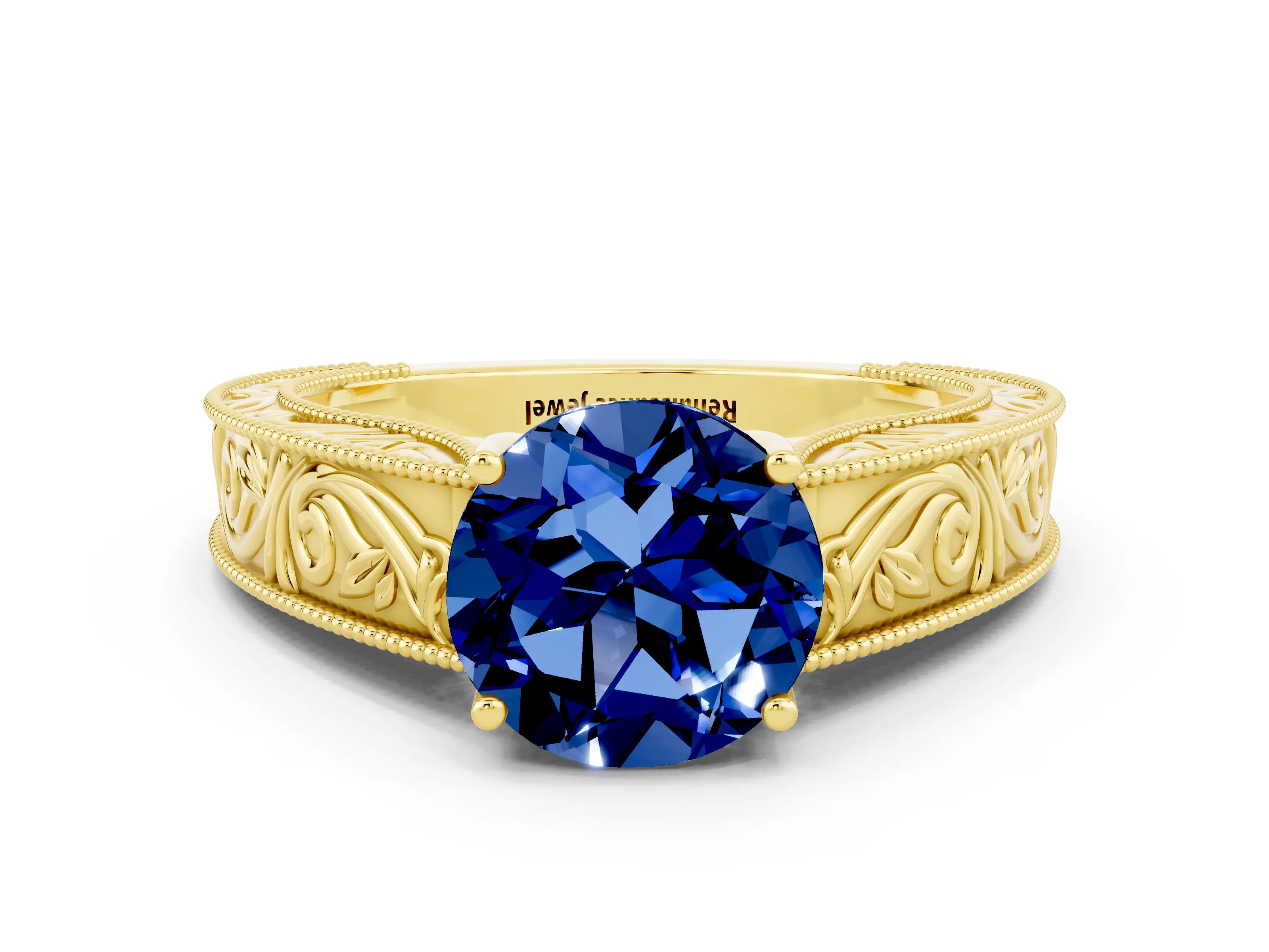 Yellow gold Round Cut Blue Sapphire Solitaire Ring with Engraved Band and Four-Prong Setting