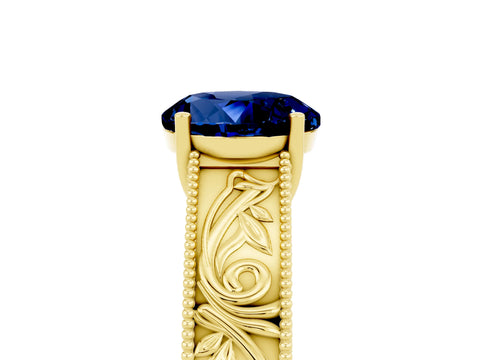 Yellow gold Round Cut Blue Sapphire Solitaire Ring with Engraved Band and Four-Prong Setting_5