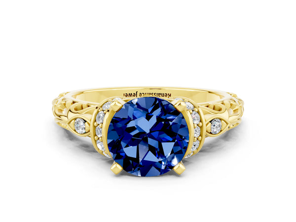 Yellow gold Round Cut Blue Sapphire Solitaire Ring with Filigree Band and Four-Prong Setting