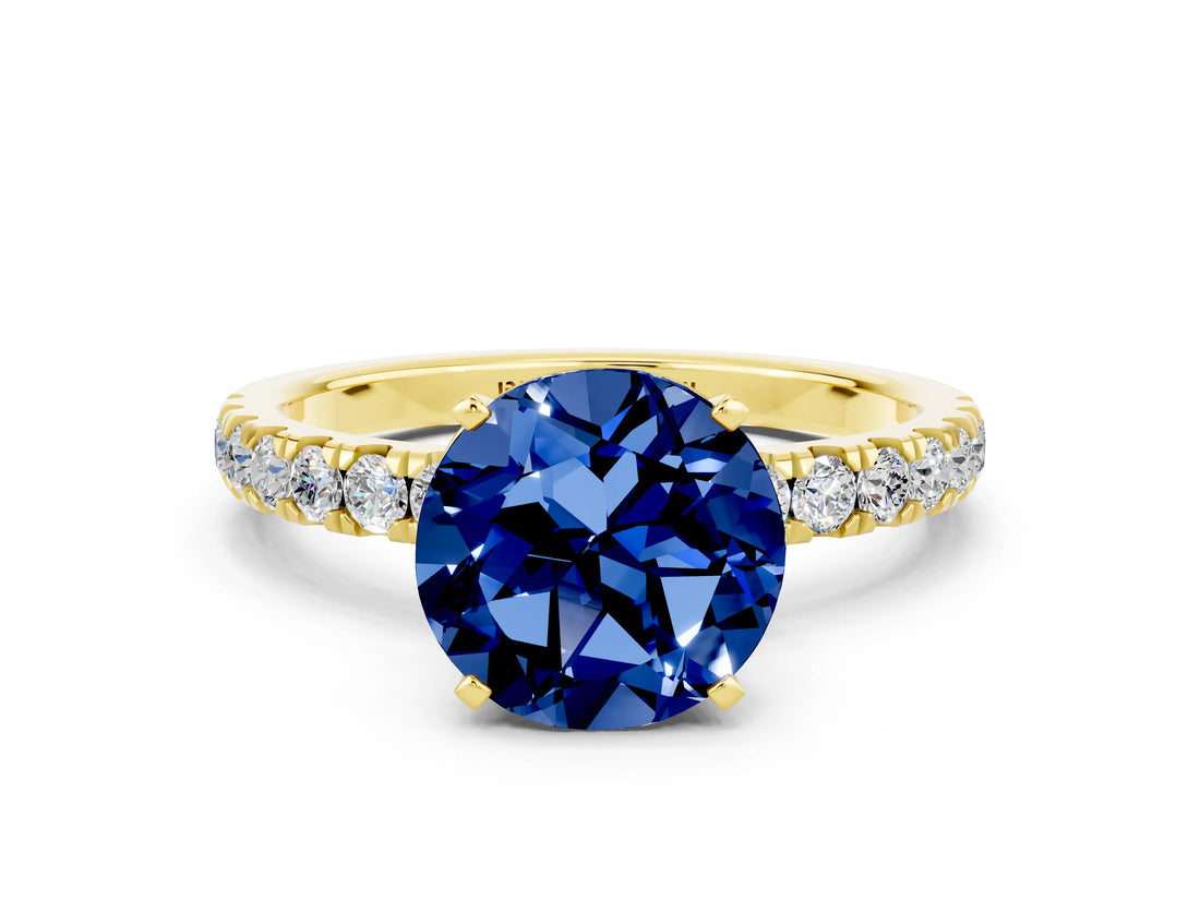 Yellow gold Round Cut Blue Sapphire Solitaire Ring with Pavé Accents and Four-Prong Setting