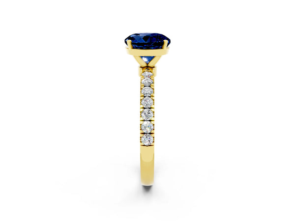 Yellow gold Round Cut Blue Sapphire Solitaire Ring with Pavé Accents and Four-Prong Setting