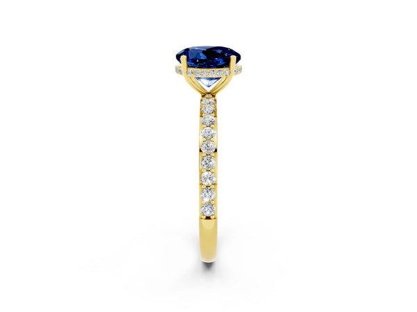 Yellow gold Round Cut Blue Sapphire Solitaire Ring with Pavé Band and Hidden Halo