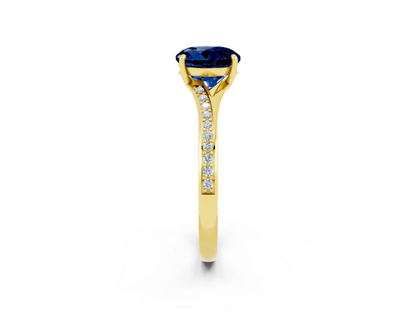 Yellow gold Round Cut Blue Sapphire Solitaire Ring with Pavé Band and Prong Setting