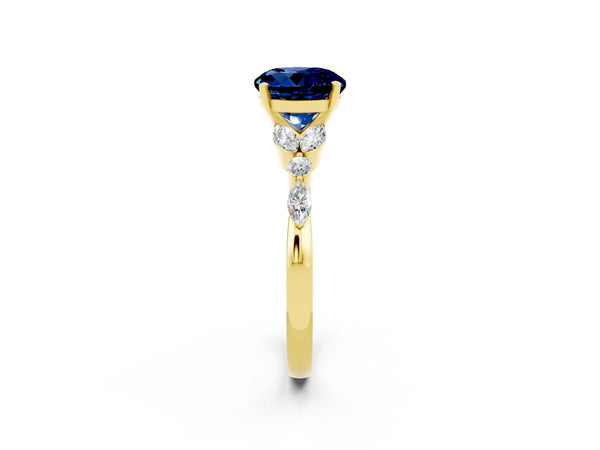 Yellow gold Round Cut Blue Sapphire Solitaire Ring with Side Stones and Four-Prong Setting