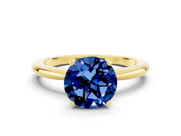 Yellow gold Round Cut Blue Sapphire Solitaire Ring with Six-Prong Setting and Classic Band