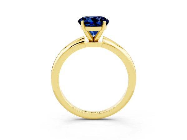 Yellow gold Round Cut Blue Sapphire Solitaire Ring with Six-Prong Setting and Classic Band
