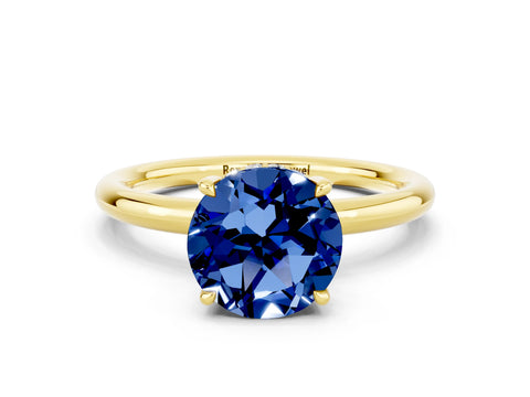 Yellow gold Round Cut Blue Sapphire Solitaire Ring with Thin Band and Four-Prong Setting_12