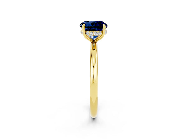 Yellow gold Round Cut Blue Sapphire Solitaire Ring with Thin Band and Four-Prong Setting