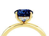 Yellow gold Round Cut Blue Sapphire Solitaire Ring with Thin Band and Four-Prong Setting_16