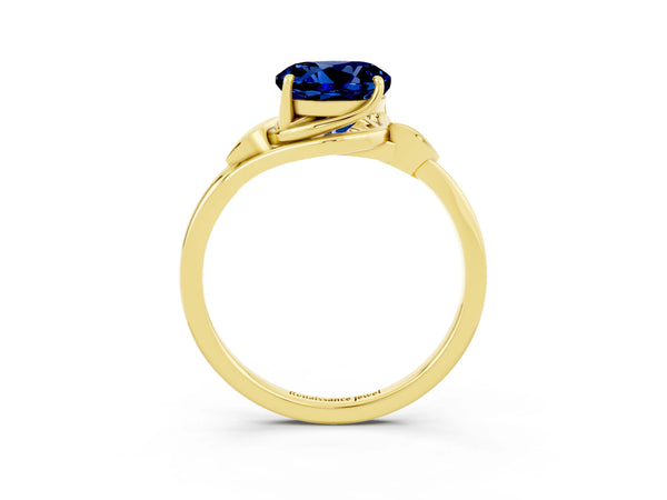 Yellow gold Round Cut Blue Sapphire Solitaire Ring with Twist Band and Four-Prong Setting