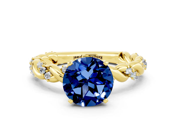 Yellow gold Round Cut Blue Sapphire Solitaire Ring with Twisted Band and Pavé Accents