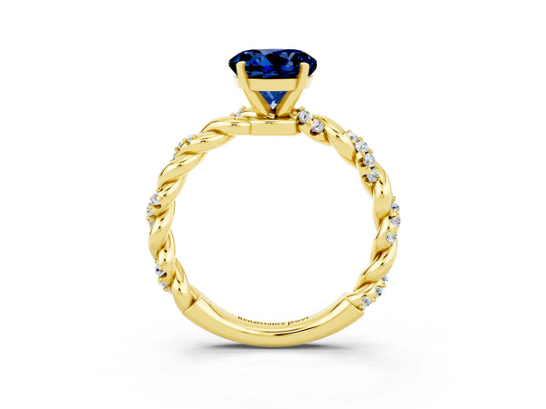 Yellow gold Round Cut Blue Sapphire Solitaire Ring with Twisted Band and Pavé Accents