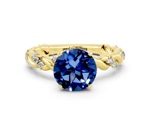 Yellow gold Round Cut Blue Sapphire Solitaire Ring with Twisted Band and Pavé Accents