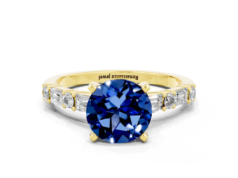 Yellow gold Round Cut Blue Sapphire Solitaire with Side Baguettes and Channel Set Band