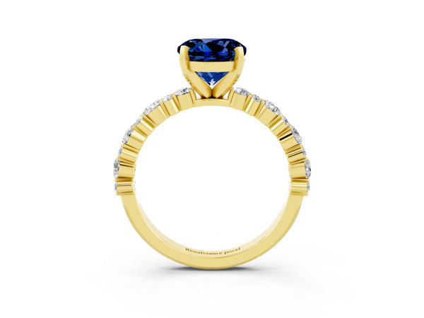 Yellow gold Round Cut Blue Sapphire Side Stone Solitaire Ring with Round  and Four-Prong Setting