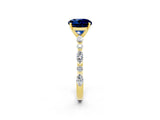 Yellow gold Round Cut Blue Sapphire Solitaire with Side Stones on a Pavé Band and Four-Prong Setting_2