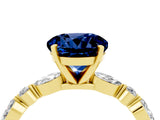 Yellow gold Round Cut Blue Sapphire Solitaire with Side Stones on a Pavé Band and Four-Prong Setting_4