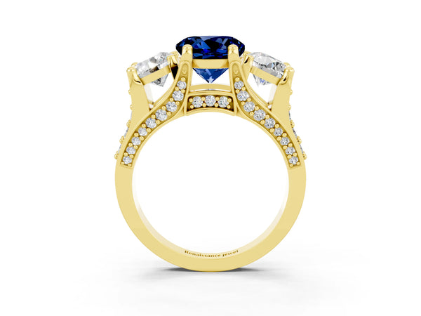 Yellow gold Round Cut Blue Sapphire Three-Stone Ring with Channel Set Band and Four-Prong Setting