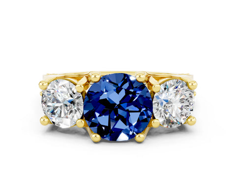 Yellow gold Round Cut Blue Sapphire Three-Stone Ring with Channel Set Band and Four-Prong Setting