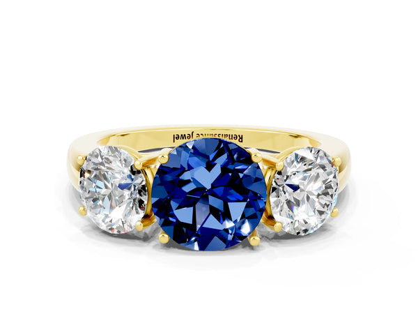 Yellow gold Round Cut Blue Sapphire Three-Stone Ring with Four-Prong Setting and Classic Band