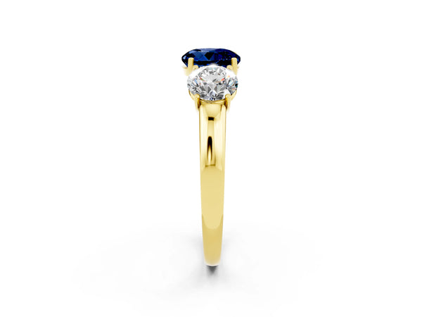 Yellow gold Round Cut Blue Sapphire Three-Stone Ring with Four-Prong Setting and Classic Band