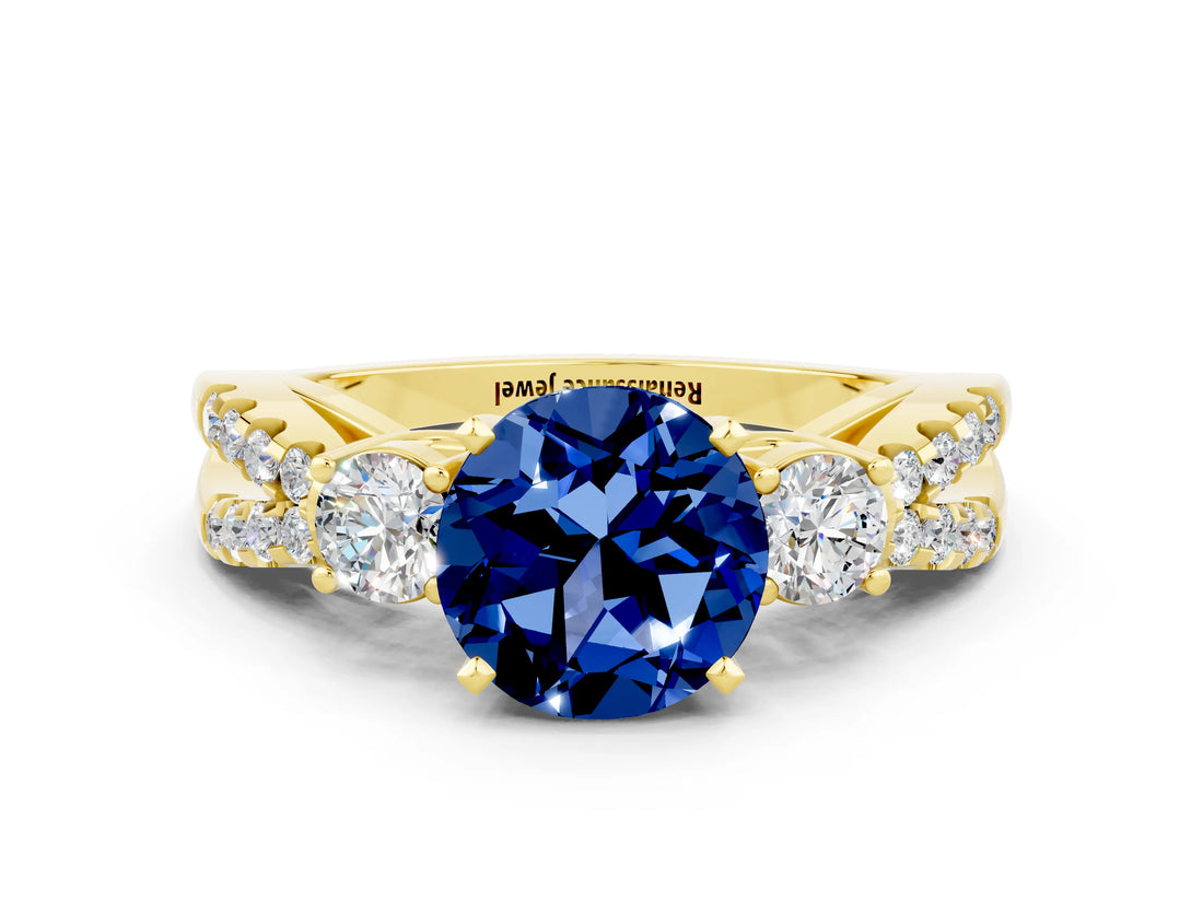 Yellow gold Round Cut Blue Sapphire Three-Stone Ring with Pavé Split Shank and Four-Prong Setting