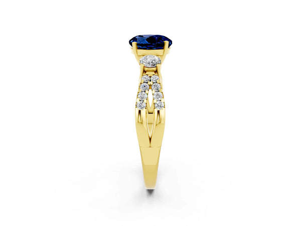 Yellow gold Round Cut Blue Sapphire Three-Stone Ring with Pavé Split Shank and Four-Prong Setting