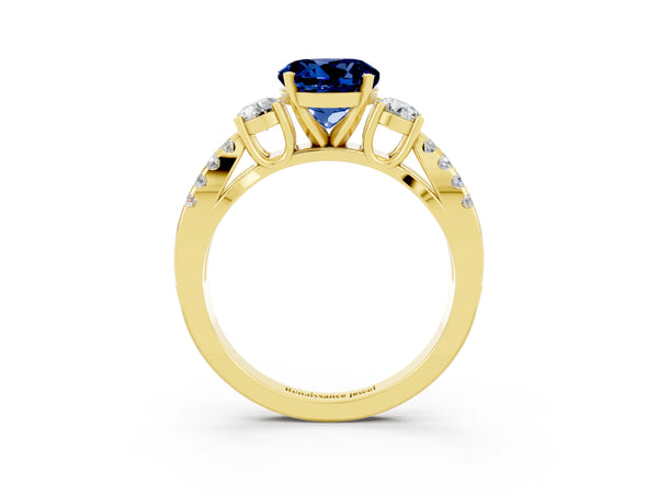 Yellow gold Round Cut Blue Sapphire Three-Stone Ring with Pavé Split Shank and Four-Prong Setting