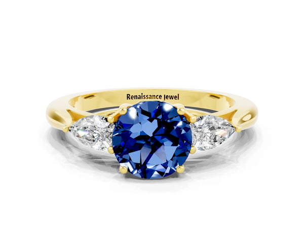 Yellow gold Round Cut Blue Sapphire Three-Stone Ring with Pear  Side Stones and Prong Setting
