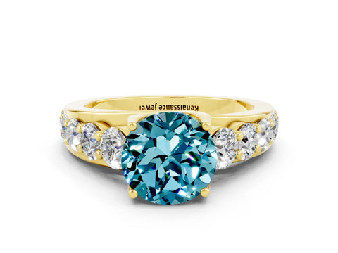 Yellow gold Round Cut Blue Topaz Engagement Ring with Pavé Band and Four-Prong Setting