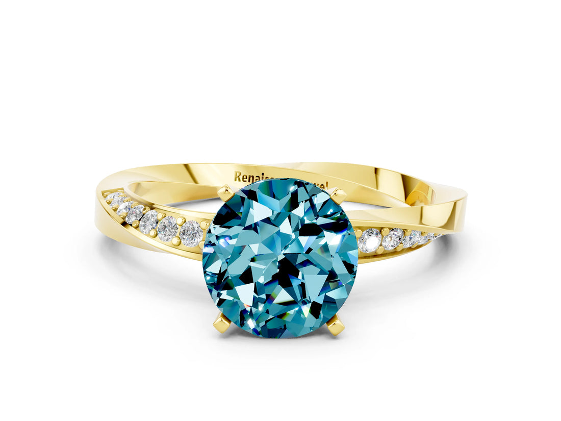 Yellow gold Round Cut Blue Topaz Engagement Ring with Side Stone Accents and Four-Prong Setting_60