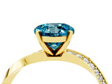 Yellow gold Round Cut Blue Topaz Engagement Ring with Side Stone Accents and Four-Prong Setting_64