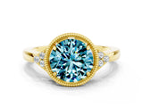 Yellow gold Round Cut Blue Topaz Halo Ring with Tapered Band and Four-Prong Setting