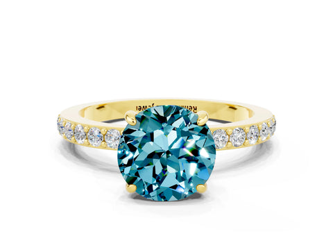 Yellow gold Round Cut Blue Topaz Ring with Pavé Band and Four-Prong Setting