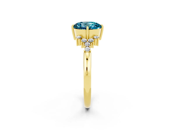 Yellow gold Round Cut Blue Topaz Ring with Side Stones and Four-Prong Setting